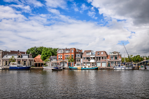 Beautiful Yachts And Buildings On De Geau River Canal, The Netherlands