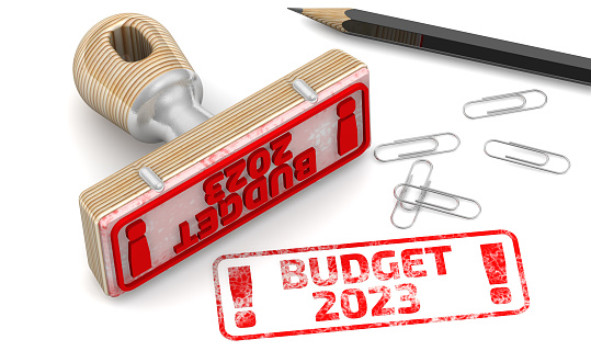 The seal stamp and red imprint BUDGET 2023 on white surface. 3D illustration