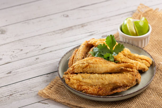 istock Fried sardines in the plate on the table. 1424064673