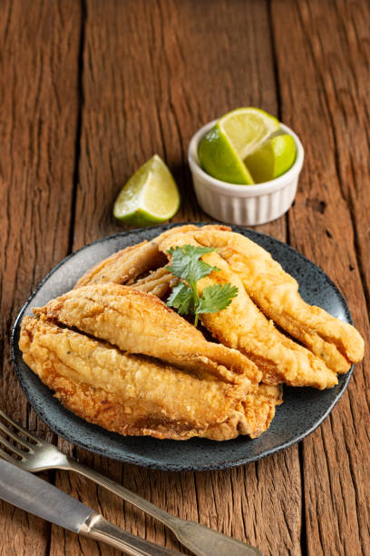 istock Fried sardines in the plate on the table. 1424064736