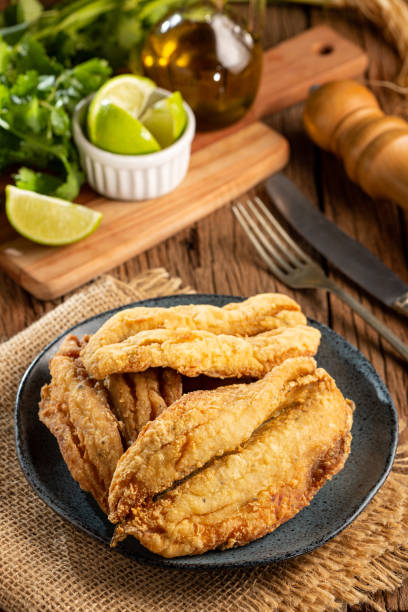 istock Fried sardines in the plate on the table. 1424064773