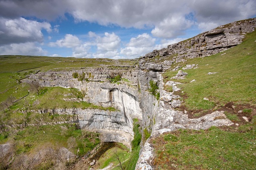 Dramatic view of ancient waterfall at Malham Cove, Malham, Yorkshire Dales National Park, UK