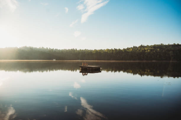 Autumn Reflections: Wooden Pier by the Mountain Lake