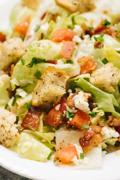 istock Wedge Chop Salad Close-up with Bacon 1424069548