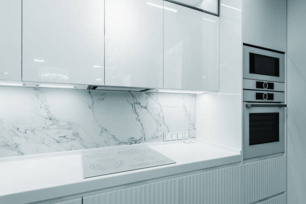istock White furniture inside of the kitchen. 1424070096