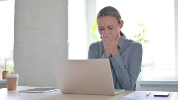 istock Woman Reacting to Loss While using Laptop 1424070195