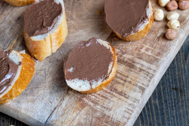 istock chocolate butter spread on a baguette, close up 1424071679