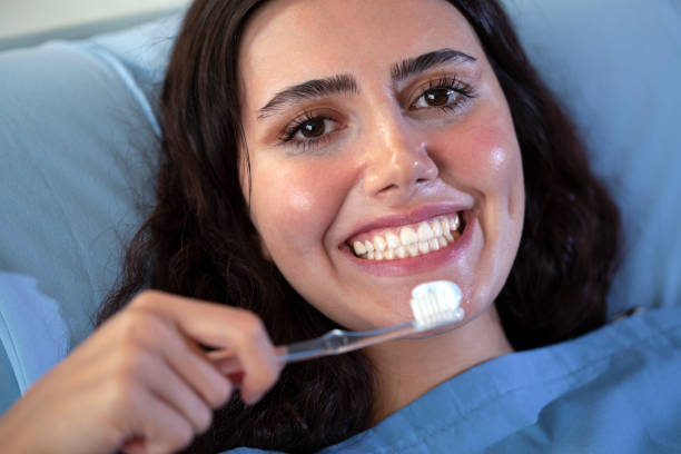 istock young woman on dentist desk 1424076962