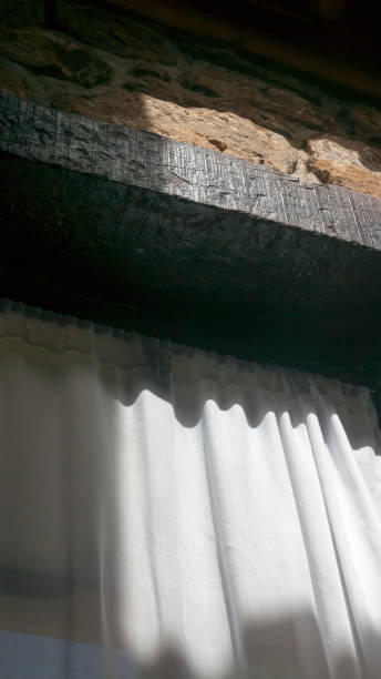 istock White curtain in window of rural house 1424079111