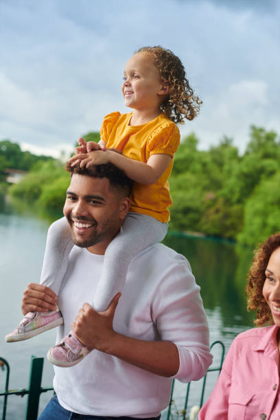 istock young family in the park 1424079164