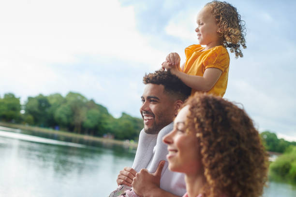 istock young family in the park 1424081361