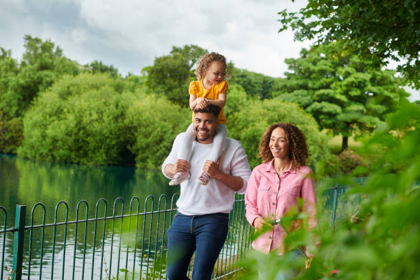 istock young family in the park 1424081565