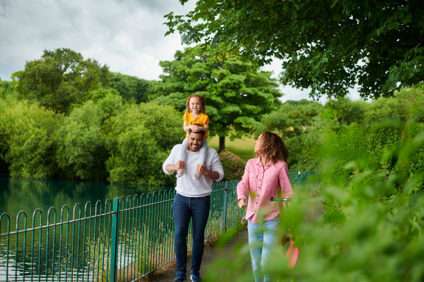 istock young family in the park 1424086511