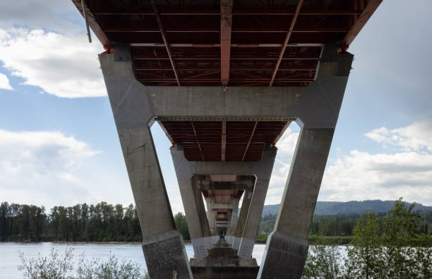 istock Mission Bridge over Fraser River during Sunny and Cloudy Spring Season Day. 1424096115