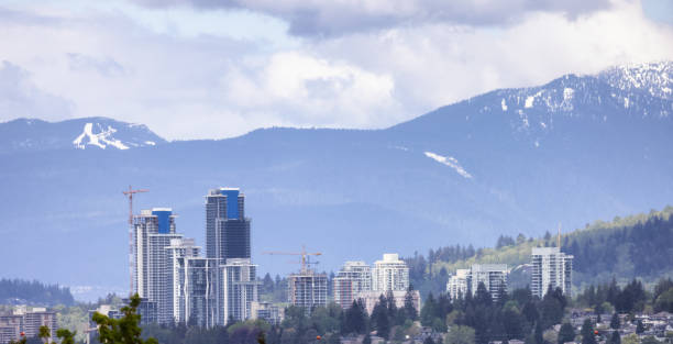 istock Modern City, Burnaby Mountains and Landscape in Background. 1424097033