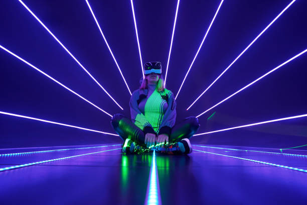 istock Woman is using virtual reality headset to access in metaverse. 1424097662