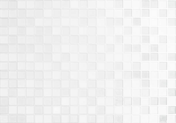 istock White tile wall chequered background bathroom floor texture. Ceramic wall and floor tiles mosaic background in bathroom and kitchen clean. Design pattern geometric with grid wallpaper decoration pool. 1424098107