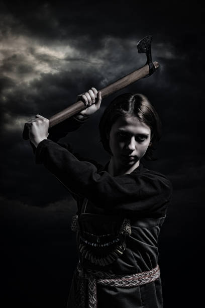 istock Scandinavian woman with axe 1424104937