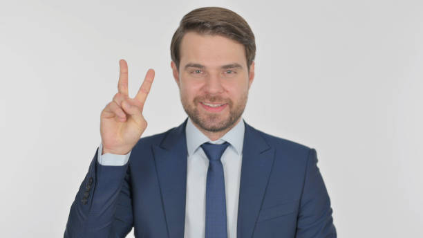 istock Young Businessman with Ok Sign on White Background 1424119544