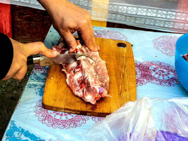 cutting raw meat for cooking shish kebab cutting raw meat for cooking shish kebab, cook's hands are visible chopped dill stock pictures, royalty-free photos & images
