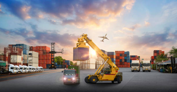 istock Logistics and transportation of Container Cargo ship and Cargo plane with working crane bridge in shipyard at sunrise, logistic import export and transport industry background 1424138661
