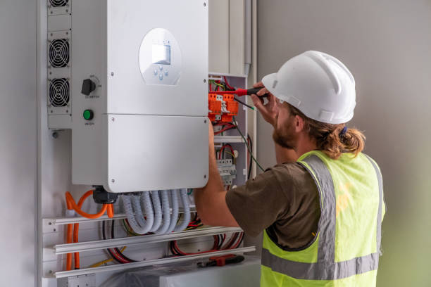 istock Electrician connecting a solar inverter 1424139128