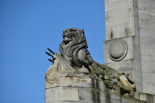 A lion on guard at the Bridge of Remembrance,  Christchurch rebuild, New Zealand