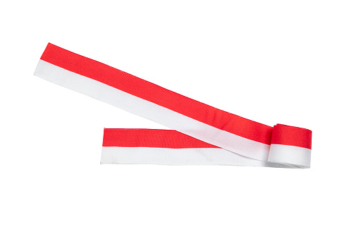 Ribbon with the red and white color of the Indonesian flag isolated over white background