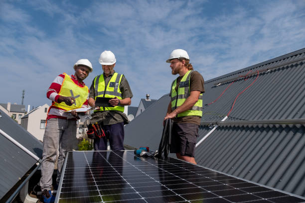 istock Electricians planning a solar installation 1424141778
