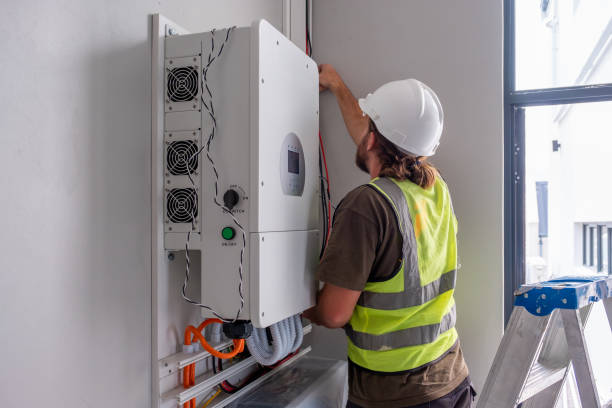 istock Electrician connecting a solar inverter 1424142286