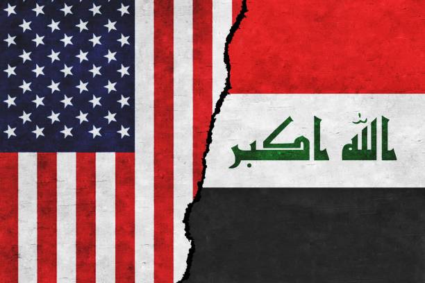istock USA and Iraq flags together. USA and Iraq conflict 1424146557