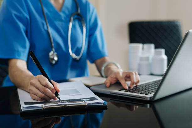 istock Medical technology concept. Doctor working with mobile phone and stethoscope in modern office 1424150238