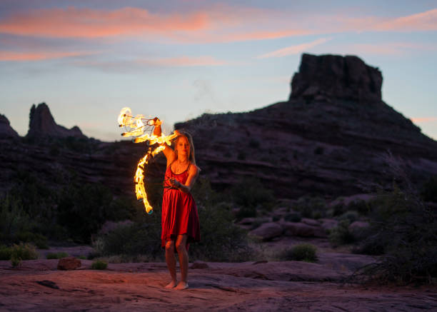 istock Fire dance at dusk in Moab Park, USA 1424150696