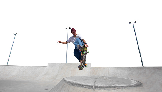 Skateboarder performing a backside Air in the half pipe.