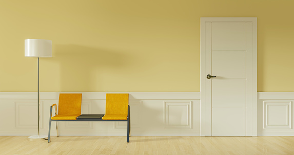 Waiting yellow chairs in a modern ligth room