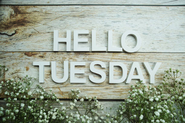 istock Hello Tuesday alphabet letters on wooden background 1424160201