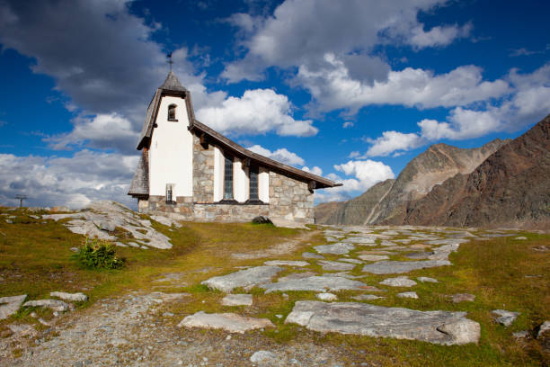 The mountain church close to Tiefenbach glacier, Austria The mountain church close to Tiefenbach glacier, Austria. The mountain church not far from the Rettenbachferner was built in a grandiose high alpine landscape, Austria rettenbach glacier stock pictures, royalty-free photos & images
