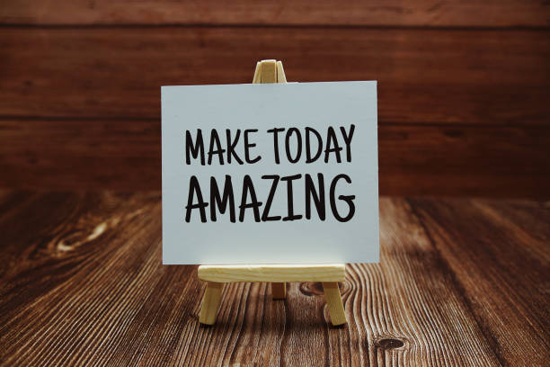 istock Make Today Amazing text on paper card on wooden background 1424168532