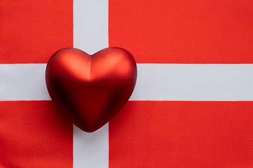 The red heart is on the flag of Denmark. The concept of patriotic feelings for one's state. Patriotism