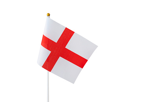 A studio shot of a flag of England waving isolated on white background