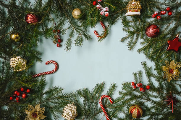 istock Christmas frame with fir and baubles. 1424176538