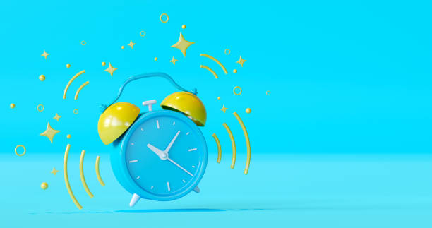 istock Blue ringing alarm clock with yellow stars on blue background. Retro design 1424176837