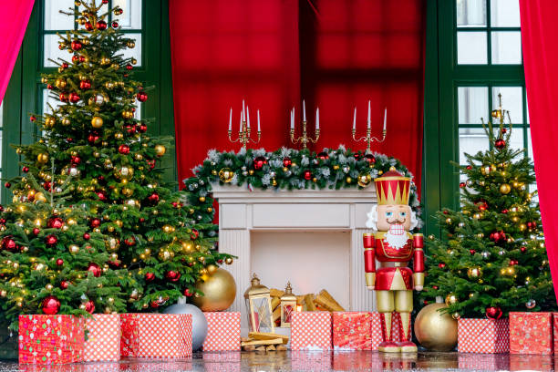 istock Theatre stage with new year decorations. Fireplace, Nutcracker. giftboxes. Celebration christmas performance for children and adults during winter holidays 1424181518