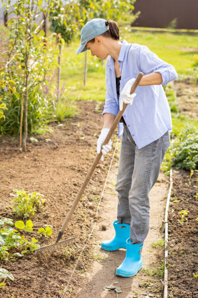 istock Happy caucasian 40 year old woman doing agricultural work 1424183285