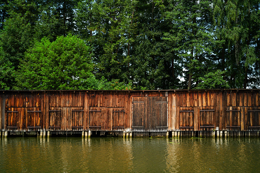 Old weathered wooden boathouses, Havel River, Brandenburg State