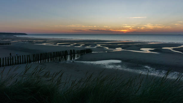 beautiful twilight after sunset on the french opal coast at the north sea, Wissant, France stock photo
