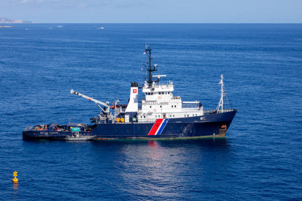 Tug boat Abeille Flandre towing on calm sea by Monaco stock photo