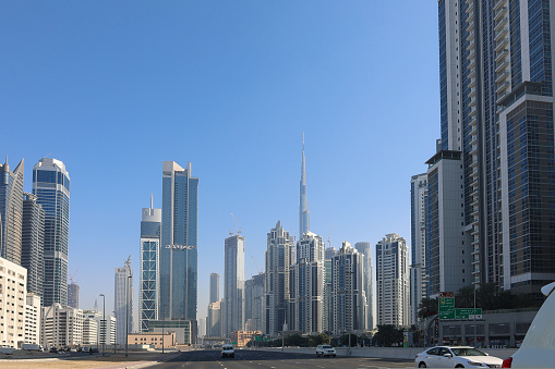 Dubai, UAE - November 27, 2021: Panoramic view of towers buildings, skyscrapers in Business Center in Dubai.