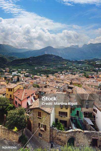 Malcesine Rooftops And Monte Baldo Range View From Castello Scaligero Italy Stock Photo - Download Image Now