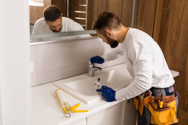 istock plumber service. wash basin installation 1424194671